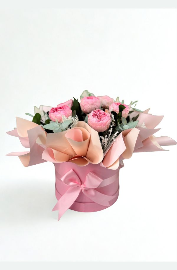 caja de peonias rosas